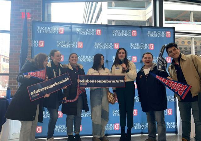students celebrating at an admitted student event